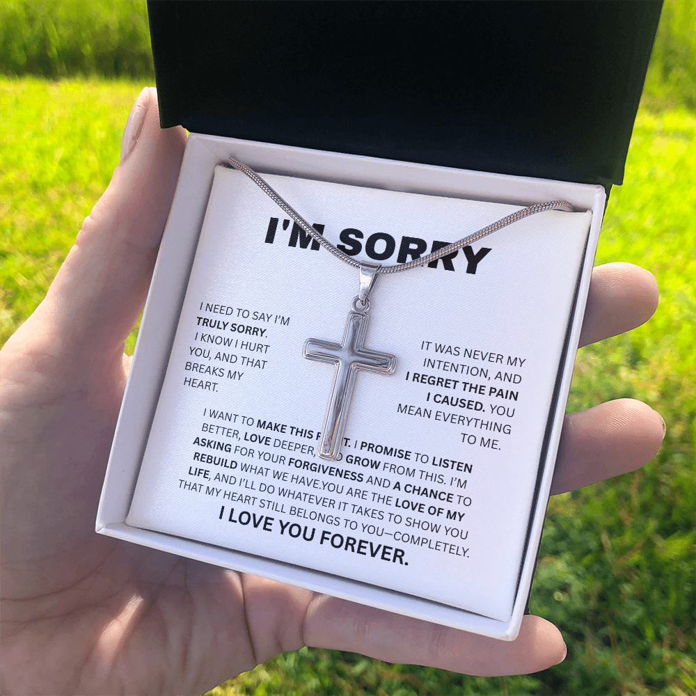 I'M SORRY  ARTISIAN CROSS NECKLACE WITH SNAKE CHAIN....TRULY SORRY